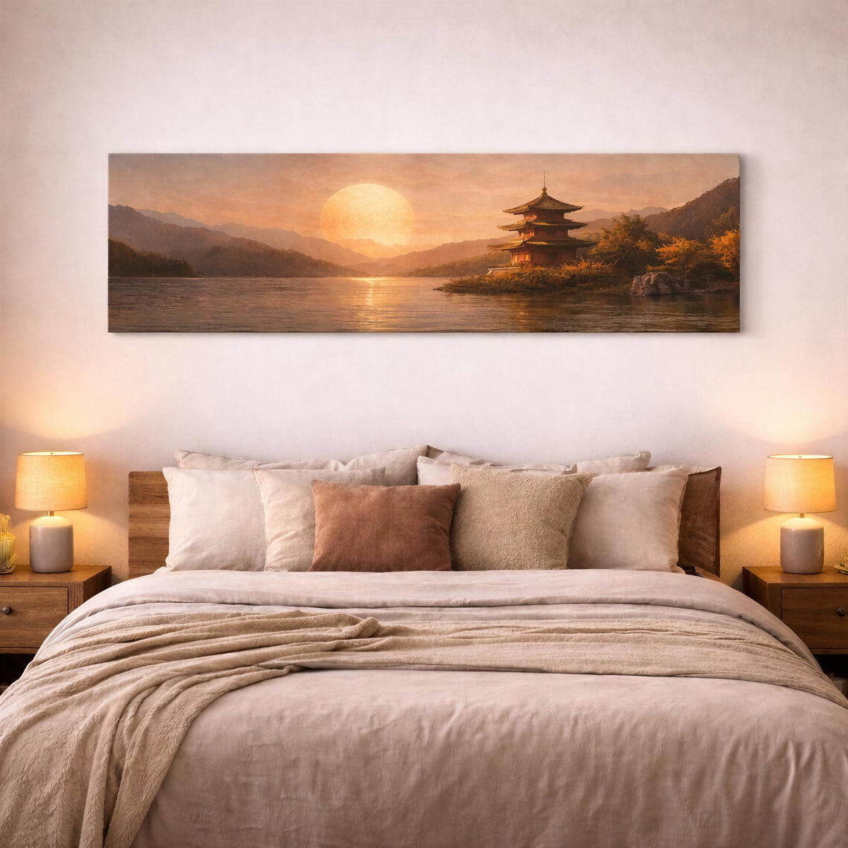 May include: Panoramic canvas art print depicting a serene Japanese landscape. The artwork features a multi-tiered pagoda on a small island, a large setting sun, and mountains reflected in the water. The color palette is warm, with shades of orange, brown, and gold.