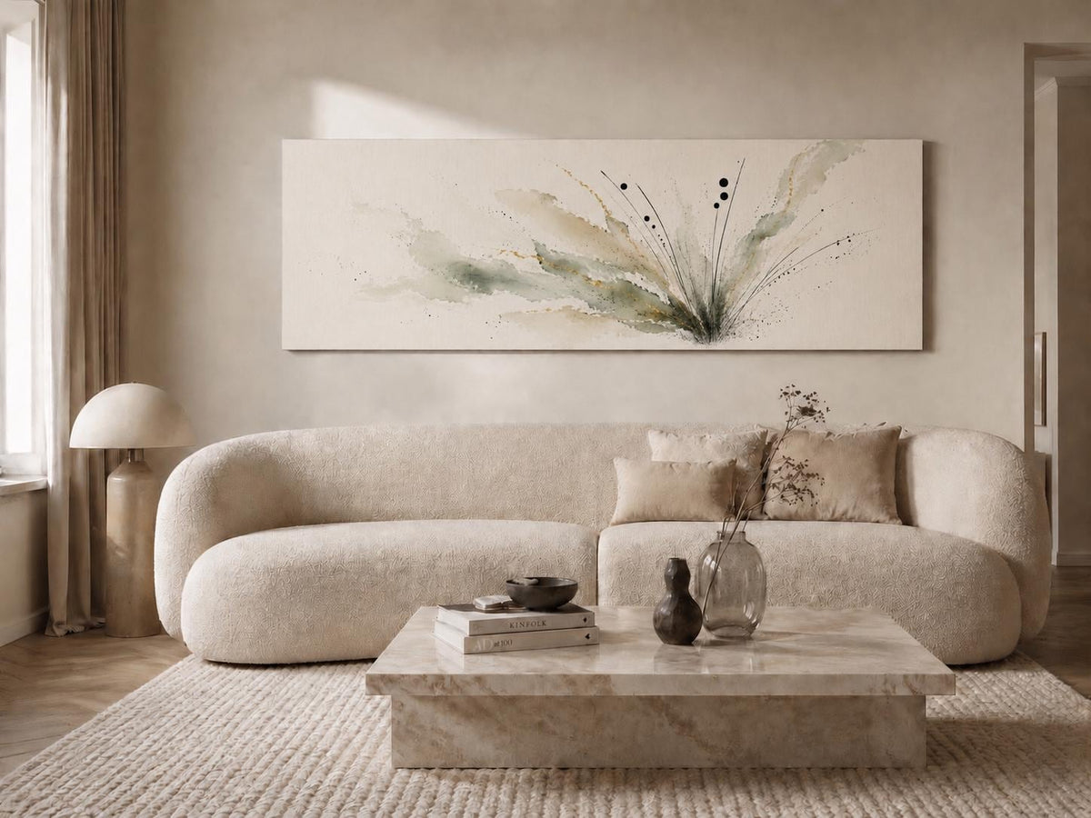 May include: A large rectangular canvas wall art piece featuring an abstract watercolor-style floral design in muted green, brown, and black tones on a cream background, displayed above a curved beige sofa with matching throw pillows.